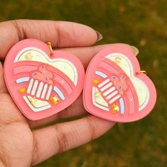 The Frunbuns Club token in pastel pink, yellow, and blue! Earrings are a pair. Brooches are available and sold as 1 piece. Earrings use a gold-toned metal. Dimensions: Dangle Earrings: 1.75 in (44 mm) L x 1.9 in (48 mm) W The drop length is about 2.0 in (51 mm). Weight: 0.32 oz or 9 grams (a bit less than the weight of 2 US quarters [11g]) Best for people who like big earrings. Brooch: 2.4 in (60 mm) L x 2.6 in (66 mm) W Materials: Mirror Acrylic Hypoallergenic, Nickel Free, Stainless Steel Note Pastel Drop Earrings For Gifts, Pastel Handmade Earrings For Gifts, Handmade Pastel Earrings For Gift, Whimsical Pink Earrings For Gift, Fun Pastel Jewelry For Gifts, Fun Pastel Colored Jewelry For Gifts, Sweet Multicolor Earrings For Gift, Playful Pink Heart Earrings For Gift, Fun Pink Earrings For Pierced Ears