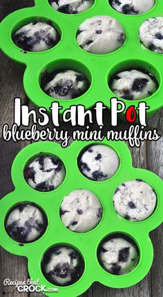 blueberry mini muffins in green tray on wooden table