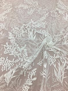 Welcome to my shop This stunning Lace Fabric design piece has soft hand feel, Perfect for wedding dress, evening dress, bridal wear, wedding gown, bodice or curtains, etc. This listing is for 1 yard, If you buy more, you will get an uncut piece. About Size : Lenght: 91cm (35.8inches); Wide: 130cm (51inches). Colors: Off-white Material: Polyester We offer special discounts for designers and wholesale orders! About Shipping: We transport free of charge through China Post. The United States usually Lace Floral Embroidered Wedding Dupatta, Wedding Lace Dupatta With Floral Embroidery, White Embroidered Lace Fabric For Ceremony, Wedding Lace Fabric With Intricate Embroidery, Cream Floral Embroidered Fabric For Wedding, Off White Floral Embroidered Fabric For Wedding, Ceremony Cream Embroidered Fabric, Off-white Embroidered Lace Fabric For Wedding, Off White Embroidered Fabric For Wedding