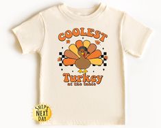 Coolest Turkey At The Table Toddler Shirt, Thanksgiving Kids Shirt, Cool Turkey Kids, Thanksgiving Dinner Shirt, Toddler or Youth Sweatshirt HOW TO ORDER 1- Check the size and color charts to find the perfect fit. 2- Choose the item style and size from the first dropdown menu. 3- Pick the clothing color from the second dropdown menu. 4- (Some listings only) If available, fill in the "Add your personalization" section following the example provided. 5- Select the quantity. 6- Click the "Add to Ca Toddler Tees Boy, Thanksgiving Toddler, Kids Thanksgiving, Girls Thanksgiving, Funny Thanksgiving Shirts, Thanksgiving Kids, At The Table, Funny Thanksgiving, Thanksgiving Shirts