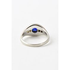 Art Deco platinum ring featuring an oval sapphire mounted with two diamonds on each side. US size 7.25; can be sized. Acid tests platinum, unmarked. The approximate weight of the stones is .50 carats for the sapphire and .16 carats for the diamonds. Age wear, light scratches on platinum and sapphire.  Dimensions reference the ring size and are not specific to the ring itself. Blue Oval Signet Ring For Formal Occasions, Silver Oval Birthstone Ring With Polished Finish, Classic Oval Sapphire Ring, Modern Oval Birthstone Ring With Tension Setting, Modern Oval Birthstone Ring For Anniversary, Classic Oval Sapphire Ring With Center Stone, Modern Round Sapphire Ring With Center Stone, Modern Oval Birthstone Ring For Formal Occasions, Classic Domed Sapphire Ring With Polished Finish