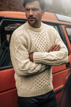 Introducing the Clyde Cable Knit Jumper from &SONS, a timeless piece crafted for those who embrace the pioneering spirit and aim to carry a legacy forward. Inspired by the rugged elegance of classic style icons, this jumper pays homage to traditional knitwear with a contemporary twist. Its intricate cable knit pattern and high-quality craftsmanship ensure it remains a wardrobe staple, perfect for layering and offering warmth and sophistication in equal measure. Designed to be cherished and passe Classic Cream Outerwear With Crew Neck, Classic Style Icons, Mountain Chic, Crown Affair, Holiday 2024, Work Wear Outfits, Stocking Fillers For Her, Cable Knit Jumper, Tree Farm