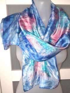 This is such a beautiful tie dye silk scarf featuring the splashes of blue and pink colors. The choice of colors is amazing. It combines dark blue and teal blue colors in a very special way creating the effect sea waves. The scarf is in excellent/mint condition. It has handrolled edges. The scarf can be used as a neck wrap, hair tie, head band and even wrist band. The scarf will make a wonderful gift. the scarf comes in a gift wrap and with a 'Thank you' card. For more scarves in my store visit: Artistic Hand Dyed Blue Silk Scarf, Hand Dyed Blue Silk Scarf For Summer, Blue Hand-dyed Silk Scarf For Summer, Blue Hand Dyed Silk Scarf For Summer, Summer Hand Dyed Blue Silk Scarf, Blue Satin Silk Scarf As Gift, Blue Satin Silk Scarf For Gift, Blue Scarf For Summer Gift, Tie Dye Scarf