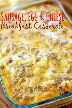 sausage, egg and cheese breakfast casserole in a glass dish on a wooden table