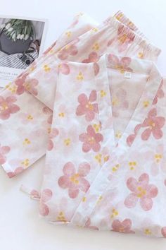 Embrace floral elegance with our Women's Floral 2-Piece Kimono Pajama Set! 🌸 Dive into luxurious comfort with this chic ensemble, perfect for lazy mornings or cozy evenings at home. Elevate your loungewear game with sophistication and style! 💫 #LoungewearLuxury #FloralKimono #CozyNights #Fashionista #NightwearFashion #SelfCare #MustHave #ComfortZone #ShopNow #OriginalPajamas Spring Sleepover Cotton Sets, Comfortable Home Sets For Spring, Spring Matching Set Sleepwear For Home, Floral Print Relaxation Sets For Spring, Floral Print Sets For Relaxation In Spring, Summer Sleepover Long Sleeve Sets, Cotton Sleepwear Long Pants For Spring, Comfortable Matching Sleepwear Set For Spring, Spring Sleepwear Sets With Relaxed Fit