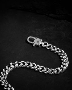 Revolutionising classic chains for an amplified impact, our Sync Chain Necklace infuses industrial decadence and subdued edge for essential, everyday wear. A polished, chunky curb chain bracelet with a custom hand-forged clasp.
Complete your look with other jewelry from the Sync Chain series. This design is not compatible with charms from The Charm Lab.
Sold individually. Each piece is lovingly crafted by hand, under ethical working conditions. Please allow for minor imperfections that are true Metal Cuban Link Bracelet With Curb Chain, Cuban Link Bracelet With Curb Chain In Metal, Metal Cuban Link Bracelet, Sterling Silver Cuban Link Bracelet With Solid Links, Sterling Silver Cuban Link Necklace With Chunky Chain, Silver Cuban Link Chain Bracelet, Chunky Cuban Link Bracelet In Stainless Steel, Luxury Cuban Link Silver Chain Bracelet, Sterling Silver Chunky Chain Bracelet