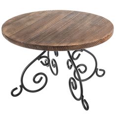 a wooden table with wrought iron legs and a circular top on an isolated white background