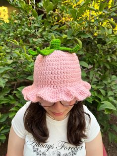 Embrace the whimsy of nature with this delightful handmade crochet bucket hat! Designed to mimic the look of a ripe strawberry, this light pink hat is topped with a charming cluster of green leaves, making it the perfect accessory for anyone who loves a touch of playful fashion. The soft scalloped edges add an extra layer of cuteness, making this hat as comfortable as it is stylish. - **Materials Soft and durable yarn, ensuring a cozy fit and long-lasting wear. - **Size Available in all sizes: N Crochet Strawberry Top, Strawberry Shortcake Halloween, Light Pink Hat, Playful Fashion, Halloween Hat, Crochet Strawberry, Crochet Bucket, Crochet Bucket Hat, Halloween Hats