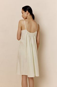 New from our 2022 Spring & Summer Collection, the Silk Cotton Slip Pajama Dress blends elegance and comfort for every evening this summer with a combination of fine silk and skin-friendly cotton — absolutely breathable and effortless to wear, with exquisitely refined design and details that allow you to move to your own rhythm and free your mind. Details Materials & Care Shipping & Returns • Designed in a subtle A-shape: a natural fit with a feminine touch. • Perfectly blends crisp, breathable c Cotton Slip, Pajama Dress, Lounge Pajamas, Sleep Dress, Silk Slip, Mulberry Silk, Sea Foam, Summer Collection, White Cotton