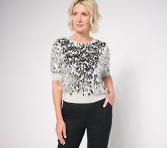 Whether you're attending a holiday party or the new restaurant that just opened downtown, arrive in showstopping style when you don this sequin sweater. Stand out from the crowd in this sparkly top and be best dressed on the guest list -- it's your time to shine. From Isaac Mizrahi Live!TM. The Guest List, Sparkly Top, New Restaurant, Sequin Sweater, Guest List, Isaac Mizrahi, Best Dressed, Elbow Sleeve, Sweater Sleeves