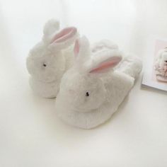 Description With Unicorn🦄 and Rabbit🐇 Slippers in the winter, you won't be suffering from chill toes.👣❄️ These cute slippers are best for you and also for your kids. Made with the finest quality material, these are designed in a perfect unicorn shape that your children would love😍. Ladies would also love to wear this beautiful white and pink pair. Get these lovely slippers to have a warm and comforting feel while wandering about in your home. These fluffy slippers🦄 is the most suitable choi Fluffy Bunny Slippers, Rabbit Slippers, Winter Cartoon, Fluffy Shoes, Unicorn Slippers, Slippers Womens, Bunny Slippers, Dr Shoes, Animal Slippers