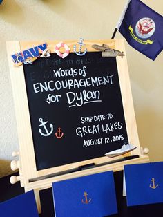 a blackboard with words and an anchor on it next to some blue cards that read words of encouragement for dylon