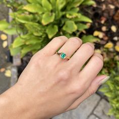 Estate/ vintage polished 10KT yellow gold ring with center, lab-created emerald + surrounding white diamonds. Timeless gold ring with a beautiful, vibrant green emerald! Size 7.25 Can be resized for an additional fee Weight: 1.8g (2) 1 pt genuine, white diamonds; SI clarity; H color Approx. 6mm x 4mm lab-created, green, rectangle center emerald Excellent estate condition Emerald Diamond Ring, Lab Created Emerald, Yellow Gold Ring, Green Emerald, Vibrant Green, Emerald Diamond, White Diamonds, Yellow Gold Rings, Diamond White