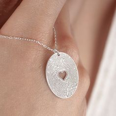 Fingerprint Jewelry, Silver Heart Stamped Necklace in Sterling Silver is made by hand in our workshop with care. All our jewelry is the most elegant choice for the Bridesmaids, friends, your loved ones and for yourself. Fingerprint Jewelry, Silver Heart Stamped Necklace * Material: High Quality Solid 925 Sterling Silver. * Dimensions: Depending on your font choice, height sizes range from 1,5 mm to 3,5 mm lowercase. * Finish: Sterling Silver ∙ Gold ∙ Rose Gold. HOW TO ORDER ❓ * Select your neckl Elegant Stamped Heart-shaped Jewelry, Etched Necklaces For Anniversary On Valentine's Day, Etched Heart-shaped Jewelry For Valentine's Day, Etched Heart Jewelry For Valentine's Day, Etched Necklaces For Anniversary And Valentine's Day, Etched Necklace For Anniversary On Valentine's Day, Valentine's Day Etched Heart Jewelry, Heart-shaped Etched Necklaces For Valentine's Day, Heart-shaped Engraved Jewelry For Wedding Gift