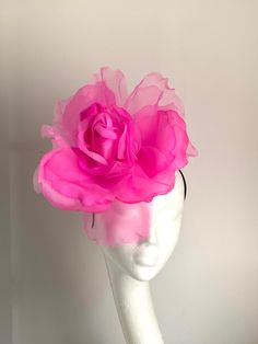 Large hot pink flower hat This amazing large hot pink flower hat is made from organza and velvet fabric. The hat sits on the black fabric-covered headband to which I attached a comb so it will sit steadily on your hair. A large hot pink flower hat will be an amazing accessory to compliment your outfit. It will fit the average head size. You can wear this amazing hat at the wedding, Christening, Horse races, and any other special occasion. Enjoy and please have a look in my shop for more hats and Rose-colored Fascinator For Party, Pink Flower Fascinator For Wedding, Pink Fascinator With Handmade Flowers For Evening, Pink Evening Fascinator With Handmade Flowers, Pink Handmade Flowers Fascinator For Evening, Pink Flower Mini Hat For Garden Party, Pink Flower Headpiece For Kentucky Derby, Pink Fascinator With Handmade Flowers For Royal Ascot, Pink Handmade Flowers Fascinator For Royal Ascot