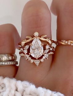 caption:Shown with 1.5ct pear Moon Rock Wedding Ring, Engagement Rings Queen, Crown Setting Engagement Ring, Rose Gold Engagement Ring Stack, Bride Wedding Ring Gold, Vintage Pear Cut Engagement Rings, Clear Quartz Engagement Ring, Vintage Princess Cut Engagement Ring, Gold Teardrop Wedding Ring