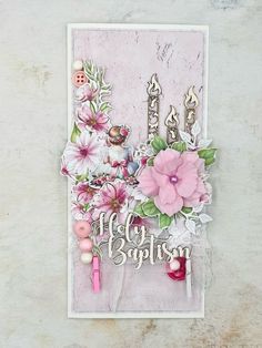 a card with flowers and candles on it