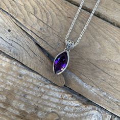 "Beautiful deep purple amethyst necklace...1 1/4\" tall with bail by 7/16\" wide at the widest spot, cast and antiqued in sterling silver 925 with a gorgeous 20mm by 10mm marquise shape amethyst stone...the chain is 18\" long also in sterling silver 925 with a lobster catch" Purple Amethyst Necklace With Large Pendant, Purple Sterling Silver Necklace With Large Pendant, Purple Amethyst Oval Pendant Jewelry, Hallmarked Amethyst Oval Pendant, Purple Sterling Silver Oval Pendant Necklace, Spiritual Purple Jewelry With Large Pendant, Purple Jewelry For Making, Stamped 925, Purple Sterling Silver Spiritual Necklaces, Purple Stamped 925 Jewelry For Jewelry Making