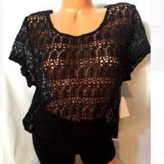 Black Short Sleeve Crotchet Top Never Worn Swim Cover Up Black Knit Top For The Beach, Casual Black Crochet Knit Top, Casual Knit Crochet Top For Party, Black Crochet Top For Spring Party, Black Open Knit Crochet Top For Vacation, Casual Black Crochet Tops, Black Crochet Casual Tops, Chic Black Crochet Top For Night Out, Black Open Knit Top For Party