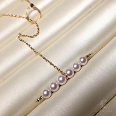 This is an exquisite pearl necklace. It is the famous balance series and including the 18k Gold chain. All Akoya pearls are imported directly from the pearl farms of Japan. Product Information Origin Japan Material Akoya Pearl and 18k Gold Dimensions Necklace Length 40-45cm (Adjustable) Pearl Shaped: Round Size: 5-6mm Quality: AAA Nacre: Very Thick Color: Rose Overtone Luster: Very High Accessories Metal: 18k Gold Other: None We Also Recommend 3.5-4mm Akoya Pearl Fashion Earring 18k Gold - AAA 4 Pearl Farm, Pearl Fashion, 18k Gold Chain, Akoya Pearls, Cluster Earrings, The Pearl, Lariat Necklace, Gold Chain, Fashion Earrings