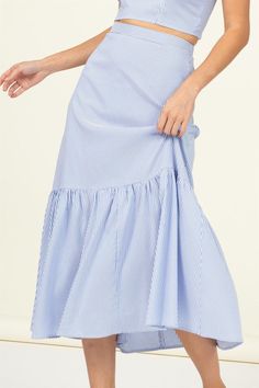 Elevate your style with our High Waist Ruffle Hem Midi Skirt. This skirt features a flattering high-waist design and a charming ruffled hem that adds a touch of elegance to any outfit. Whether you're dressing up for a special occasion or adding a chic flair to your everyday look, this midi skirt is the perfect choice. The high-waist design cinches your waist, creating a lovely silhouette, while the ruffled hem adds a playful and feminine touch. Imported. Designed in the USAModel is wearing a sma Open Palm, Blue Midi Skirt, Ruffle Hem Skirt, Blue Striped Top, Striped Midi Skirt, Swimwear Dress, Skirt Fits, Hem Skirt, Sheer Fabrics