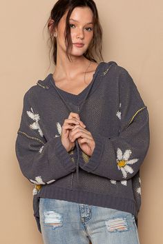 Get cozy in our Charcoal Daisy Patterned Hoodie Sweater! This high low sweater is perfect for layering over leggings or your favorite jeans. The versatile design is elevated by a playful floral pattern, adding a fun element to your wardrobe. Comfortable Stretch Hoodie For Fall, Cozy Fit Hoodie For Spring, Spring Cozy Hoodie With Drawstring Hood, Cozy Spring Hoodie With Drawstring Hood, Comfortable Cozy Sweater For Spring, Cozy Fit Sweater For Spring, Comfortable Long Sleeve Hoodie For Spring, Comfy Long Sleeve Spring Hoodie, Comfy Long Sleeve Hoodie For Spring