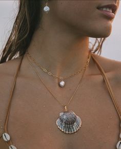 This 24k gold plated Scallop Shell Necklace is sure to elevate your beachy attire. If you want a necklace that is a conversation starter, this is the one! 100% Tarnish free (just rinse with freshwater after the beach!) and ready for all of your mermaid activities! 18 inches Luxury Elegant Shell Necklace For Beach, Elegant Cheap Shell Necklace, Cheap Elegant Adjustable Shell Necklace, Luxury White Shell Jewelry, Affordable Cute Vacation Jewelry, Cheap Summer Vacation Jewelry, Luxury Shell Jewelry For Beach, Cheap Gold Shell For Summer, Necklace City Beach