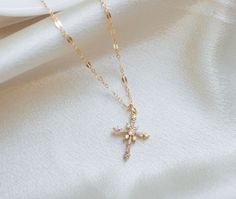 ∙ ∙ S P A R K L I N G ∙ C R O S S ∙ N E C K L A C E ∙ ∙ Made with the following: Gold Plated Cross 23mm x 9mm 14K Gold Filled Findings  14K Gold Filled Spring Clasp 14K Gold Filled Chain This listing is for one necklace. The third picture shows the necklace paired with the Mini Paperclip Necklace https://www.etsy.com/listing/985278174/ and the Sweet to the Soul Necklace https://www.etsy.com/listing/766035933/ (sold separately). ∙ ∙ H O W ∙ T O ∙ O R D E R ∙ ∙ Please select the chain and length f Christian Necklace For Women, Dainty Pendant Cross Necklace For Gift, Dainty Cross Pendant Necklace For Gift, Dainty Cross Pendant Necklace As Gift, Dainty Pendant Cross Necklace, Delicate Cross Pendant Necklace For Gift, Delicate Cross Necklace For Gift, Delicate Cross Necklace Perfect As A Gift, Gift Cross Pendant Necklace With Clavicle Chain