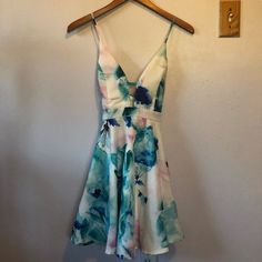 New With Tags Size Small Never Worm, Perfect Condition Turquoise V-neck Summer Dress, Green Lined Dress For Spring, Spring Green Lined Dresses, Green Lined Spring Dress, Green Floral Print Sundress For Party, Fitted Turquoise Summer Dress, Turquoise Fitted Dress For Vacation, Chic Turquoise Midi Dress For Summer, Turquoise Midi Dress For Summer Party