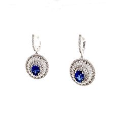 Oval Blue Sapphire Diamond Earring in 14k White Gold Metal: 14K White  Gold  Diamond: Natural  Gemstone: Natural Diamond (VS.) Diamond Color: F-G  284 Diamond Weight: 2.50 CT   2 Sapphire Weight: 03.67 CT  Length: 1.4 inches Made in USA *𝐑𝐞𝐭𝐮𝐫𝐧 𝐏𝐨𝐥𝐢𝐜𝐲 Satisfaction Guaranteed,  Exchange within 14 days receipt of purchase. *𝐒𝐡𝐢𝐩𝐩𝐢𝐧𝐠 If you can put your selection in your cart, it's in stock and will ship within 24 hours  Free shipping in the US Flat rate International order. All pieces came with a jewelry box. *𝐆𝐞𝐦𝐨𝐥𝐨𝐠𝐢𝐜𝐚𝐥 𝐀𝐏𝐏𝐑𝐀𝐈𝐒𝐀𝐋 We have the ability to provide you with an appraisal and a certificate if you're interested.  All Diamonds or Gemstone are Natural and Genuine. (G.I.A), (A.G.I).  *𝐀𝐝𝐝𝐢𝐭𝐢𝐨𝐧𝐚𝐥 𝐑𝐞𝐪𝐮𝐞𝐬𝐭 If you would like to see Blue Sapphire Diamond, Diamond Earring, Vs Diamond, Diamond Color, Sapphire Diamond, White Gold Diamonds, A A, Blue Sapphire, Colored Diamonds