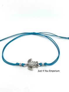 Turtle ankle bracelet - turquoise blue Turtles are frequently depicted in popular culture as easygoing, patient, and wise creatures. Due to their long lifespan, slow movement, sturdiness, and wrinkled appearance, they are an emblem of longevity and stability and protection in many cultures around the world. These pretty ankle bracelets are handmade from waxed nylon cord and metal alloy beads ( no nickel) The anklet opens to 34cm or you can wear it as a bracelet and just re-knot the ends and snip Cord Anklet, Turquoise Anklet, Surfer Jewelry, Slow Movement, Turtle Gifts, Gift For Her Birthday, Ankle Bracelet, Jewellery Gift, Popular Culture