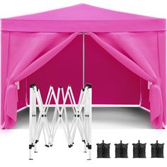 a pink tent with four black poles and five white posts in front of the tent