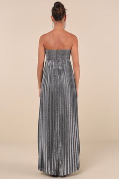 Cheers to a glam and gorgeous night out in the Lulus Glittering Luxury Silver Lurex Pleated Strapless Maxi Dress! Lightweight woven fabric boasts sparkling, silver Lurex threading as it shapes a sweetheart neckline (with hidden no-slip strips) and a strapless, plisse-textured bodice with a cinched, bow-like design. High empire waist tops a cascading, pleated A-line skirt that falls to a sweeping maxi hem. Hidden back zipper/clasp. Fit: This garment fits true to size. Length: Floor length. Size m Silver Chic Cocktail Evening Dress, Chic Silver Cocktail Evening Dress, Sparkling Strapless Evening Dress, Glamorous Silver Evening Dress For Cocktail, Silver Maxi Dress For Gala Party, Glamorous Silver Cocktail Evening Dress, Glamorous Strapless Evening Dress, Silver Glamorous Maxi Dress For Gala, Glamorous Strapless Dress For Evening Party Season