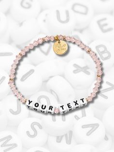 Whether it’s your anniversary date, a cute inside joke, or her favorite mantra, make this dainty rose crystal bracelet totally hers by customizing it with something meaningful. It’s the sweetest way to add a personal touch she’ll love (and brag about to her friends). Little Words Project, Inside Joke, Dainty Rose, Rose Crystal, Beads Charm, Anniversary Dates, Touching Herself, Inside Jokes, White Elephant