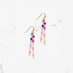 Delicate Rainbow beaded dangle earrings. Nickel free gold plated hooks. 14k Gold-filled Beaded Drop Earrings, Beaded 14k Gold Filled Dangle Earrings, 14k Gold Filled Beaded Dangle Earrings, Colorful Dangle Beaded Earrings, Adjustable Chandelier Earrings With Colorful Beads, Gold Dangle Earrings With Colorful Beads, Gold Tassel Dangle Earrings With Colorful Beads, Crystal Drop Earrings With Dangling Beads, Indie Earrings