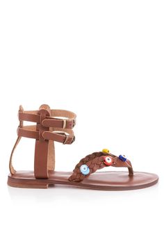 Step up your summer style with our handcrafted Brown Braided Leather Sandals! These open-toe sandals combine comfort and vibrant design, perfect for your casual yet stylish look.  Tan Color 👁️ Unique Design: Braided leather straps adorned with colorful, eye-like embellishments set you apart from the crowd. 🔗 Double Ankle Straps: Two adjustable metallic buckles ensure a secure and customizable fit. 🌞 Comfortable Sole: Crafted from premium leather, the sole provides comfort for all-day wear. 🌈 Versatile Style: A perfect match for both casual and slightly upscale outfits. 👣 Handmade Quality: Each pair is meticulously handcrafted, showcasing excellent craftsmanship and attention to detail. 👜 Lightweight & Packable: Ideal for travel, these sandals are easy to pack and won't weigh you down Adjustable Brown Toe Ring Sandals For Vacation, Bohemian Brown Toe Ring Sandals For Vacation, Adjustable Bohemian Leather Sandals, Adjustable Brown Toe Ring Sandals For Beach, Adjustable Multicolor Toe Ring Sandals For Summer, Adjustable Leather Bohemian Toe Ring Sandals, Bohemian Brown Toe Post Sandals, Bohemian Leather Toe Ring Sandals For Vacation, Handmade T-strap Sandals With Toe Post For Vacation