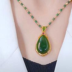 This exquisite emerald Jade stone necklace features a sophisticated water drop pendant. The beautiful jade gives the necklace a timeless look that can make any outfit special. Enjoy its natural elegance to enhance your style!

Natural emerald Jade stone
Chain length: 45 CM (+ 5 cm adjustable chain)
High quality alloy
Pendant size:30*55mm
Adjustable lobster clasp size - one size fits all
Hypoallergenic, lead and nickel free

If you aren't in LOVE with your purchase, please let us know within 30 d Rabbit Charm, Necklace Packaging, Lovers Necklace, Party Necklace, Necklace For Girlfriend, Drop Pendant Necklace, Necklace Patterns, Jade Stone, Love Necklace