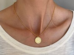 Trendy Dainty Gold/Silver Coin Necklace, Ottoman Coin Necklace, Layering Necklace Great for Layering Necklace as well as on its Own. Coin Diameter 18mm Model is UK Size 8 and wearing 16 inch necklace. * P r o d u c t i o n T i m e s * All items in my shop are handcrafted made to order. Please check individual items for the most up to date info for production dates. If you need to customize your order please contact us with Etsy convo before submitting order. * P l a t i n g * All our chains and Coin Necklace Silver, Coin Necklace Gold, Gold Medallion Necklace, Silver Coin Necklace, Large Ottoman, 16 Inch Necklace, Gold Coin Necklace, Layered Necklaces Silver, Gold Medallion