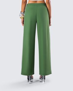 Even though it’s not a race, you’ll still take first place in these green track pants 😜 Perfect for dressing up or down, these pants are made from high quality ripstop fabric and complete with a relaxed fit, double piping on both sides, and side pockets 💚 Sporty Green Pants With Elastic Side Panels, Sporty Full-length Green Bottoms, Sporty Green Straight Pants, Green Stretch Parachute Pants With Elastic Waistband, Green Stretch Parachute Pants, Green Sporty Parachute Pants, Sporty Green Full-length Parachute Pants, Green High-waisted Parachute Pants With Side Pockets, Green Sporty Wide Leg Parachute Pants