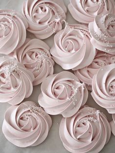 pink icing roses with pearls on them