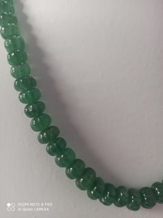 18''Natural Green Strawberry Quartz AAA 315 Carat Fine Quality Smooth Pumpkin Beads Gemstone adjustable cord Necklace Stone :Natural Green Strawberry Quartz Shape :- fancy Pumpkin Necklace - 18 inch 1 line string Size :- 7-10 MM Weight :- 315 carat Polish :- Handmade Quality - AAA Purity :- 100% Natural Gemstone color - green makes a great gift for your loved ones. It is known as the 'love stone' as the message it emits is the strong vibration of unconditional love, joy, warmth and healing. As q Rondelle Crystal Necklace With Gemstone Beads, Adjustable Round Aventurine Necklace, Handmade Adjustable Emerald Necklace, Handmade Adjustable Emerald Necklace With Round Beads, Handmade Adjustable Beaded Emerald Necklace, Adjustable Rondelle Crystal Necklace For Healing, Adjustable Spiritual Rondelle Necklaces, Adjustable Jade Gemstone Beaded Necklace, Adjustable Jade Beaded Necklaces With Gemstones