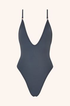 Turn heads with our iconic emerald green one-piece swimsuit. Featuring a stunning plunging neckline and a rich, vibrant hue, this design embodies confidence and sophistication with every splash. More than just swimwear, this emerald green one-piece is a true style statement. Cut & Fit Shaping, sculpting fit Pulls on Plunging neckline High-cut style with medium coverage brief Hardware & Straps All gold hardware Adjustable shoulders straps Lining & Fabric Double-lined  84% polyamide, 1 One Piece Bathers, Black One Piece Bathing Suit, Gold One Piece, Bathing Suit One Piece, Brown One Piece, Grey One Piece, Purple One Piece, Green One Piece Swimsuit, One Piece Bathing Suits