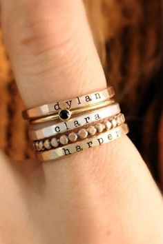 One of our best selling kids name ring stacks - this three kids name ring stack makes the perfect jewelry Christmas gift for moms & meaningful gift for moms!  These baby name rings for moms are the perfect way to keep your kiddo's love close. Adjustable Stackable Rings Stamped 14k, Adjustable Stackable 14k Gold Rings, Personalized 14k Gold Meaningful Jewelry, Heirloom Style Personalized Everyday Rings, Custom Name Adjustable 14k Gold Jewelry, Gold Sterling Silver Initial Stackable Ring, Gold Sterling Silver Stackable Initial Ring, Heirloom Style Gold Stackable Sterling Silver Rings, Heirloom Gold-toned Sterling Silver Stackable Rings