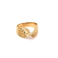 1980's Vintage 14k yellow gold statement ring. The ring is a size 6.75 and can be sized. The height of the ring off of the finger is 5.9mm. The width of the ring is 8.4mm. The ring weighs 3.76 of gold. 14k Yellow Gold Wide Band Signet Ring, Formal 14k Yellow Gold Wide Band Ring, Hallmarked 14k Gold Wide Band Ring, Formal 14k Gold Bypass (open) Ring, Formal 14k Gold Open Snake Ring, Formal 14k Gold Open Bypass Ring, 14k Yellow Gold Wide Band Open Ring, 14k Yellow Gold Open Wide Band Ring, Heirloom Yellow Gold Wide Band Open Ring