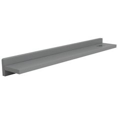 a gray shelf that is on the wall