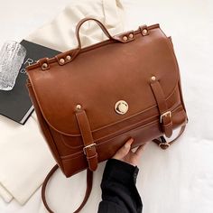 Pack up your essentials in this roomy satchel backpack that also doubles up as a crossbody bag. PU faux leather exterior with magnetic buckle closures. Zip-up main compartment. Fits A4 books and iPad. 30cm x 24cm x 11cm / 11.8" x 9.45" x 4.3" Satchel Backpack, Mocha Brown, Shoe Gifts, Overall Dress, Sweater Blouse, Cardigan Jacket, Satchel Bags, Zip Ups, Crossbody Bag