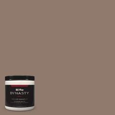 a can of dynastity paint on a gray background with the word dynasti