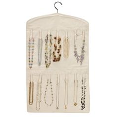 an over the door jewelry organizer hanging on a wall