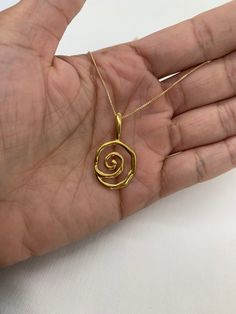 Gold Spiral Necklace design made of Gold Vermeil ☞ thickest 18k Gold Plating on top of Solid 925 Sterling Silver ☞ made to last.Matching Earrings - please ask meMatching Ring - please ask me Details:• Pendant Height 31.5mm, Width 18mm• Free Complimentary Chain• 18k Gold Vermeil Swirl Shaped Yellow Gold Jewelry Gift, Yellow Gold Swirl Jewelry Gift, Handmade Spiral Yellow Gold Jewelry, Spiral Hammered Jewelry As Gift, Spiral Hammered Jewelry Gift, Spiral Yellow Gold Jewelry With Polished Finish, Polished Yellow Gold Spiral Jewelry, 14k Gold Spiral Jewelry For Anniversary, Gold Spiral Jewelry