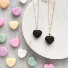 "A simple and sweet, heart shaped lava stone hangs on your choice of sterling silver, 14k gold filled, or choose between stainless steel in gold, silver or rose gold. Wear this necklace alone, with your favorite essential oil or layer it with other necklaces for a trendy layered look! How to use: Simply drop or rub one to two drops of your essential oil(s) directly to the lava stone. Since lava stones are naturally porous, they absorb the oils and you get to benefit from the therapeutic properti Everyday Heart Shaped Nickel Free Necklace, Minimalist Nickel-free Heart Jewelry, Hypoallergenic Necklace For Valentine's Day Gift, Hypoallergenic Everyday Necklace For Valentine's Day, Minimalist Hypoallergenic Heart Pendant Jewelry, Minimalist Hypoallergenic Heart Charm Necklace, Minimalist Nickel-free Heart-shaped Jewelry, Minimalist Handmade Necklace For Valentine's Day, Minimalist Heart Beads Jewelry For Gift